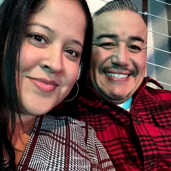 Husband and wife smiling
